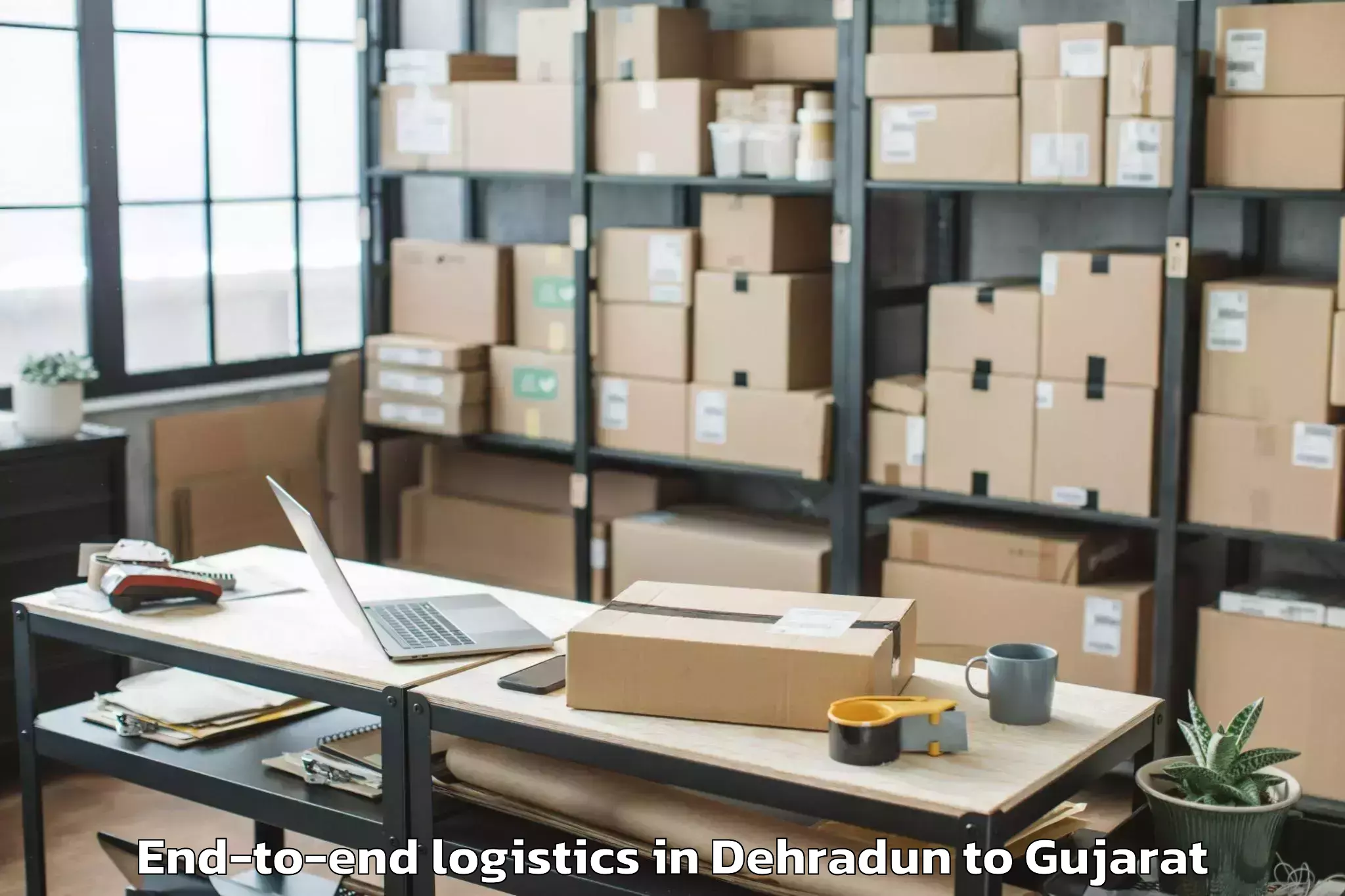 Book Your Dehradun to Mendarda End To End Logistics Today